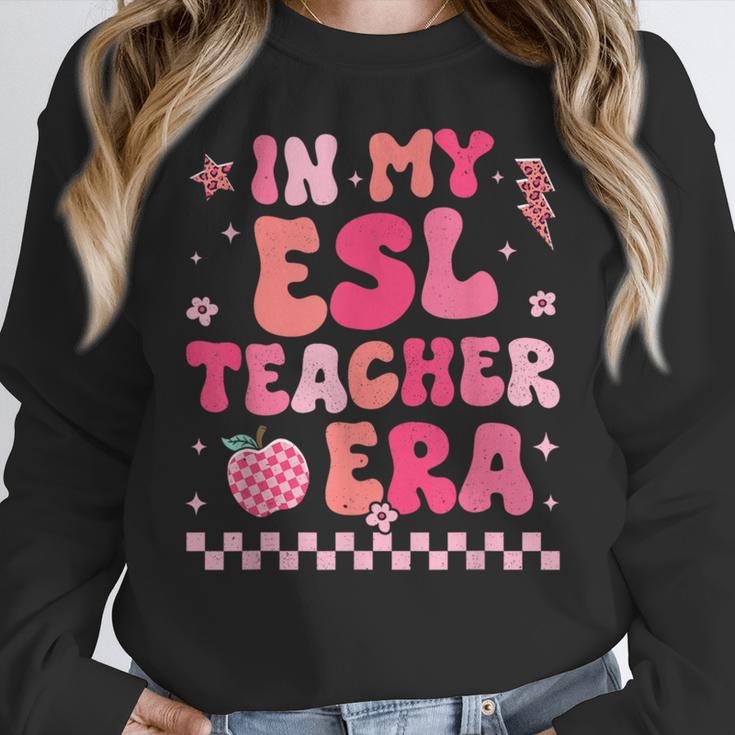 In My Esl Teacher Era Back To School ESL Teacher Groovy Women Crewneck Sweatshirt, Esl Teacher Gifts, Groovy Teacher Gifts, funny design In My Esl Teacher Era Back To School ESL Teacher Groovy Women Crewneck Sweatshirt, Esl Teacher Gifts, Groovy Teacher Gifts, funny design