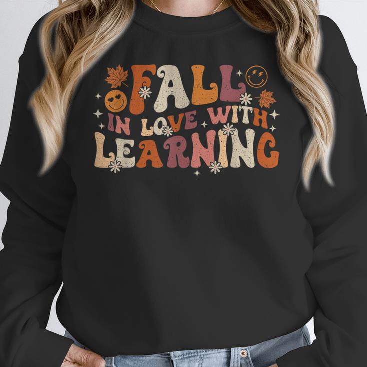 Fall In Love With Learning Autum Thanksgiving Teacher Kids Women Crewneck Sweatshirt, funny design Fall In Love With Learning Autum Thanksgiving Teacher Kids Women Crewneck Sweatshirt, funny design