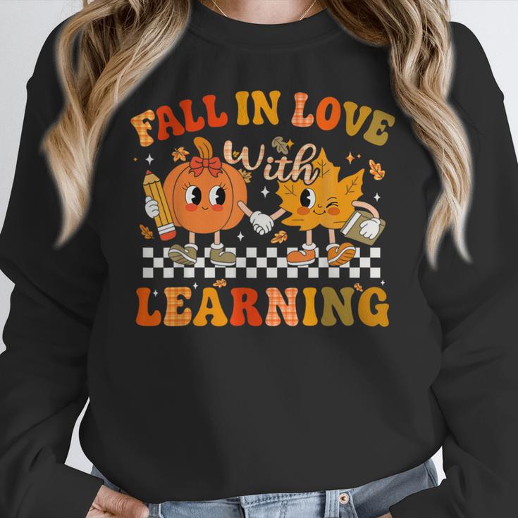Fall In Love With Learning Autumn Pumpkin Fall Teacher Kids Women Crewneck Sweatshirt, funny design