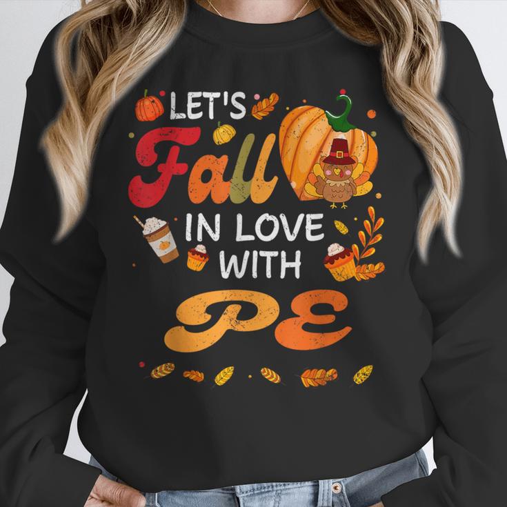 Lets Fall In Love With PE Teacher Thanksgiving Women Crewneck Sweatshirt, Pe Teacher Gifts, funny design