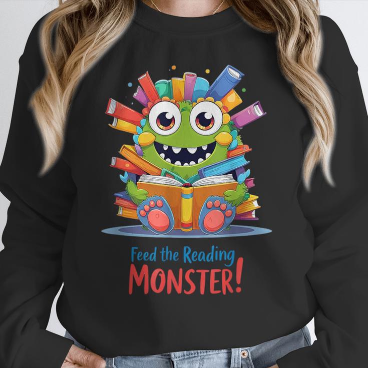 Feed The Reading Monster Halloween Teacher Women Crewneck Sweatshirt, funny design