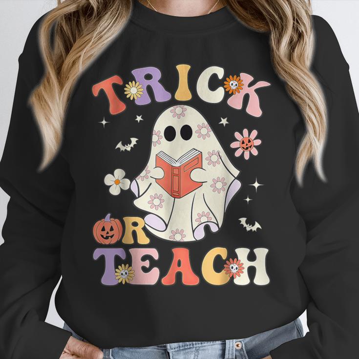 Groovy Halloween Trick Or Teach Retro Floral Ghost Teacher Women Crewneck Sweatshirt, Groovy Teacher Gifts, funny design Groovy Halloween Trick Or Teach Retro Floral Ghost Teacher Women Crewneck Sweatshirt, Groovy Teacher Gifts, funny design