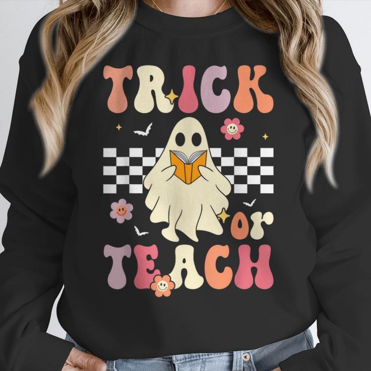 Groovy Teacher Halloween Retro Trick Or Teach Floral Ghost Women Crewneck Sweatshirt, Groovy Teacher Gifts, funny design Groovy Teacher Halloween Retro Trick Or Teach Floral Ghost Women Crewneck Sweatshirt, Groovy Teacher Gifts, funny design