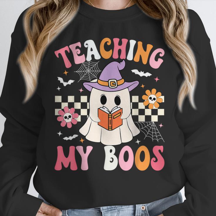 Groovy Teaching My Boos Teacher Ghost Halloween Teacher Women Crewneck Sweatshirt, Groovy Teacher Gifts, funny design Groovy Teaching My Boos Teacher Ghost Halloween Teacher Women Crewneck Sweatshirt, Groovy Teacher Gifts, funny design