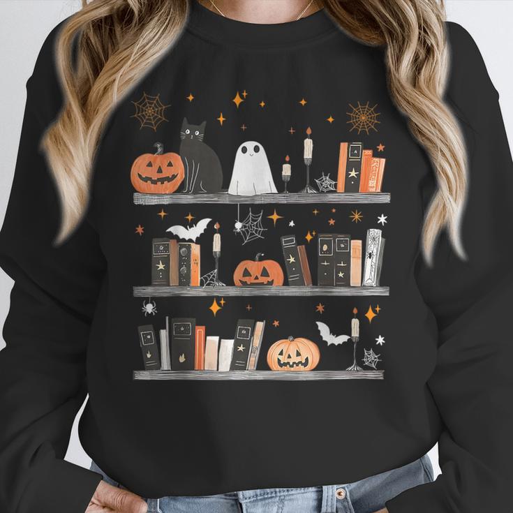 Halloween Library Ghost Books Teacher Spooky Trick Or Teach Women Crewneck Sweatshirt, funny design Halloween Library Ghost Books Teacher Spooky Trick Or Teach Women Crewneck Sweatshirt, funny design