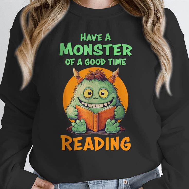 Halloween Teacher Librarian Monster Reading Books Men Women Kids Women Crewneck Sweatshirt, funny design