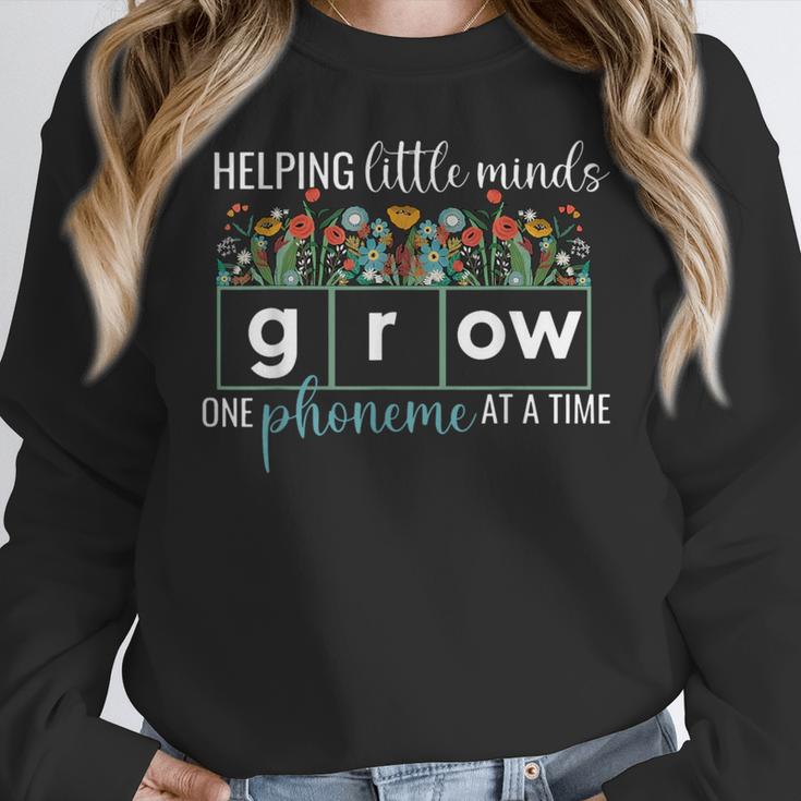 Helping Little Minds Grow One Phoneme At A Time Teacher Women Crewneck Sweatshirt, funny design