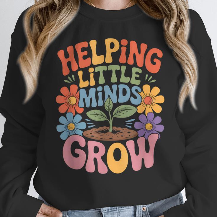 Helping Little Minds Grow Teacher First Day Back To School Women Crewneck Sweatshirt, funny design Helping Little Minds Grow Teacher First Day Back To School Women Crewneck Sweatshirt, funny design