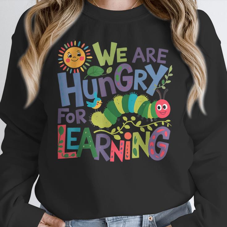 We Are Hungry For Learning Teacher Life Back To School Women Crewneck Sweatshirt, funny design We Are Hungry For Learning Teacher Life Back To School Women Crewneck Sweatshirt, funny design