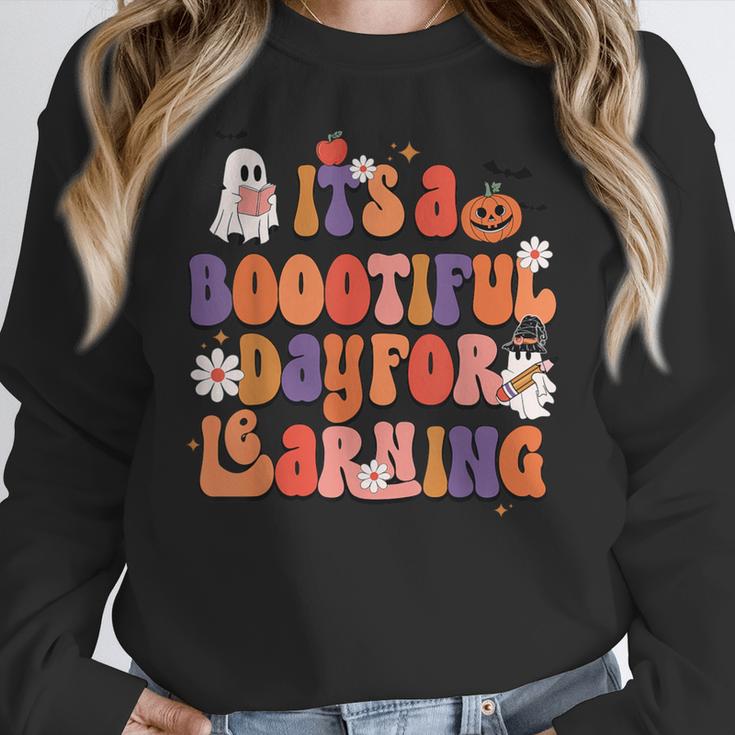 It's A Bootiful Day For Learning Cute Teacher Halloween Women Crewneck Sweatshirt, funny design It's A Bootiful Day For Learning Cute Teacher Halloween Women Crewneck Sweatshirt, funny design