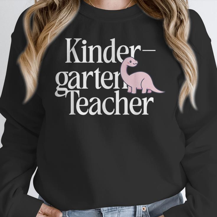 Kindergarten Teacher Dinosaur Back To School Women Crewneck Sweatshirt, funny design Kindergarten Teacher Dinosaur Back To School Women Crewneck Sweatshirt, funny design
