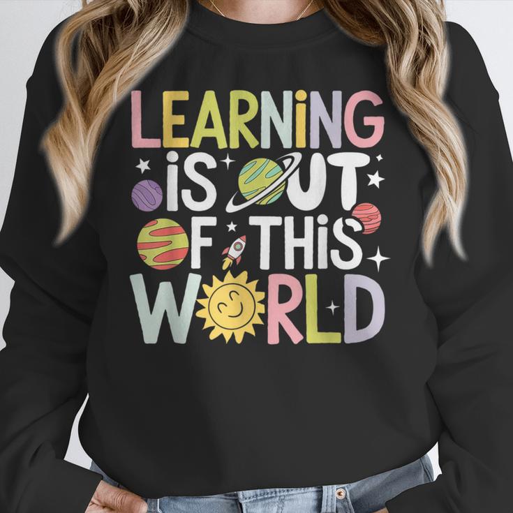 Learning Is Out Of This World Space Teacher Cute Groovy Women Crewneck Sweatshirt, Groovy Teacher Gifts, funny design Learning Is Out Of This World Space Teacher Cute Groovy Women Crewneck Sweatshirt, Groovy Teacher Gifts, funny design