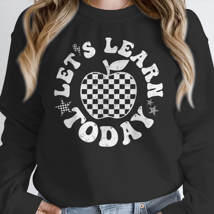 Let's Learn Today Checkered Apple Back To School Teacher Women Crewneck Sweatshirt, funny design Let's Learn Today Checkered Apple Back To School Teacher Women Crewneck Sweatshirt, funny design