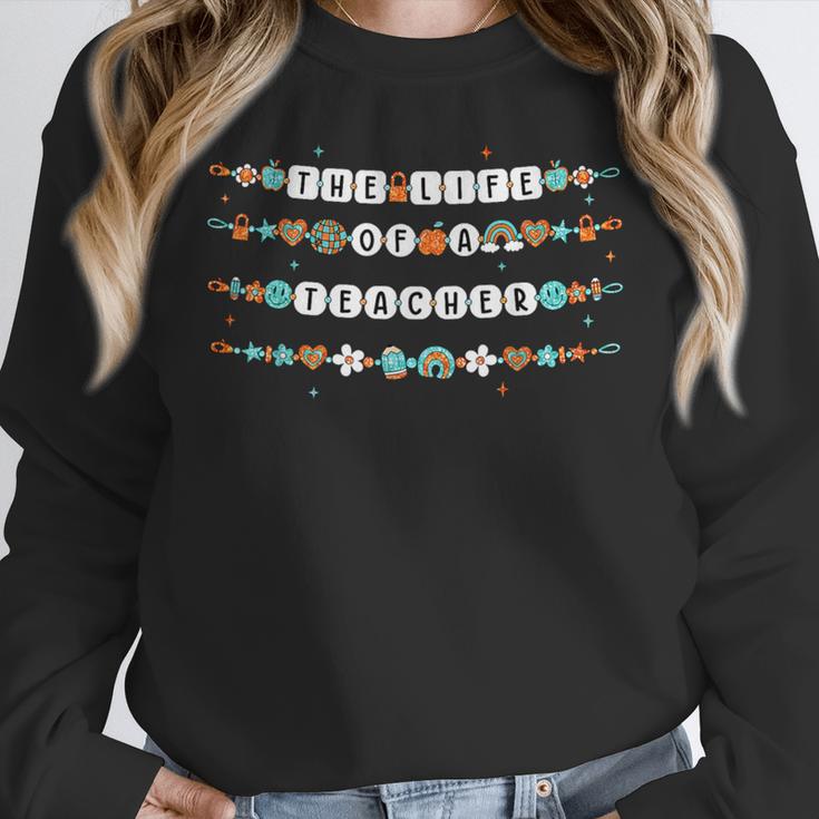 The Life Of a Teacher Teacher Bracelets Elementary School Women Crewneck Sweatshirt, funny design The Life Of a Teacher Teacher Bracelets Elementary School Women Crewneck Sweatshirt, funny design