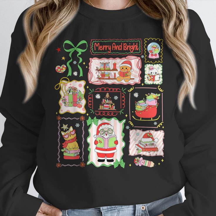 Merry And Bright Christmas Gingerbread Santa Book Teacher Women Crewneck Sweatshirt, funny design Merry And Bright Christmas Gingerbread Santa Book Teacher Women Crewneck Sweatshirt, funny design