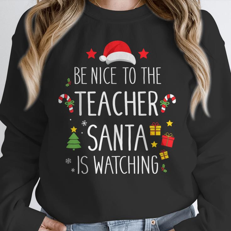 Be Nice Teacher Santa Watching Xmas School Students For Men Women Women Crewneck Sweatshirt, funny design