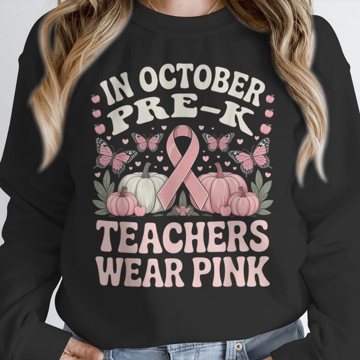In October Pre-K Teachers Wear Pink Ribbon Breast Cancer Women Crewneck Sweatshirt, funny design