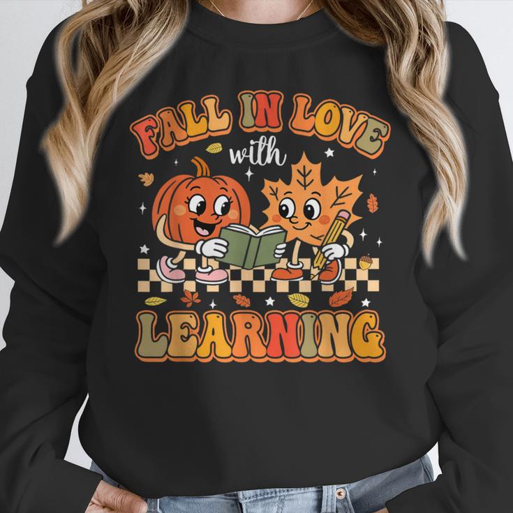 Retro Fall In Love With Learning Autumn Pumpkin Teachers Women Crewneck Sweatshirt, funny design