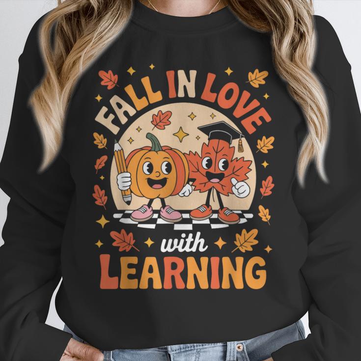 Retro Fall In Love With Learning Pumpkin Leaf Teacher Autumn Women Crewneck Sweatshirt, funny design Retro Fall In Love With Learning Pumpkin Leaf Teacher Autumn Women Crewneck Sweatshirt, funny design