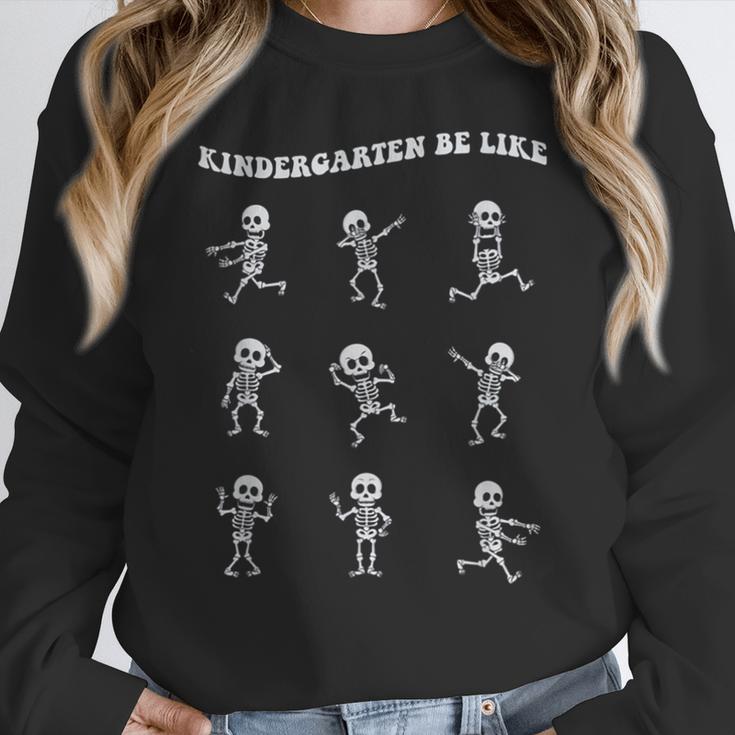 Retro Halloween Kindergarten Teacher Skeleton Trick Or Treat Men Women Kids Women Crewneck Sweatshirt, funny design