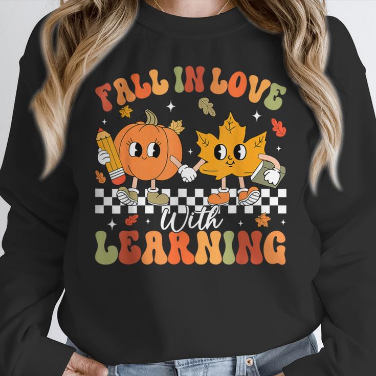 Retro Pumpkin Fall In Love With Learning Autumn Teacher Women Crewneck Sweatshirt, funny design Retro Pumpkin Fall In Love With Learning Autumn Teacher Women Crewneck Sweatshirt, funny design