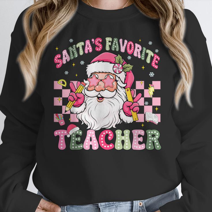 Santa's Favorite Teacher Groovy Christmas Teacher Boys Girls Women Crewneck Sweatshirt, Groovy Teacher Gifts, funny design Santa's Favorite Teacher Groovy Christmas Teacher Boys Girls Women Crewneck Sweatshirt, Groovy Teacher Gifts, funny design