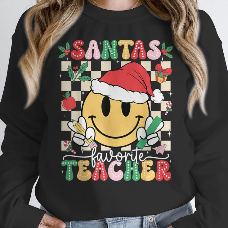 Santas Favorite Teacher Retro Groovy Smile Face Christmas Women Crewneck Sweatshirt, Groovy Teacher Gifts, funny design