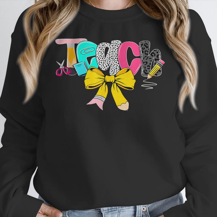 Teach Coquette Bow Teacher Back To School Happy First Day Women Crewneck Sweatshirt, funny design Teach Coquette Bow Teacher Back To School Happy First Day Women Crewneck Sweatshirt, funny design