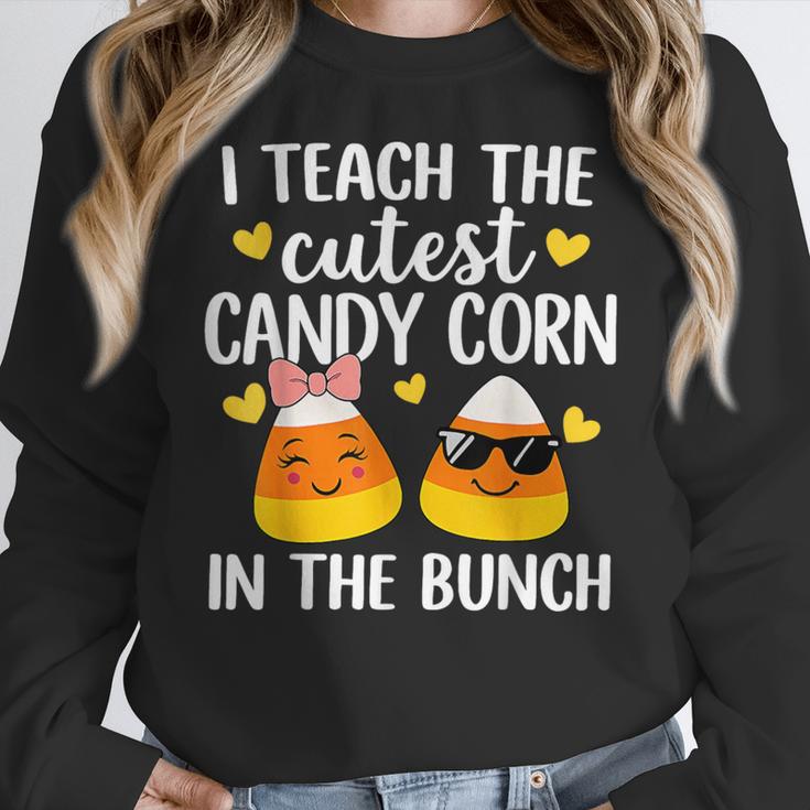 I Teach The Cutest Candy Corn In The Bunch Teacher Halloween Women Crewneck Sweatshirt, funny design I Teach The Cutest Candy Corn In The Bunch Teacher Halloween Women Crewneck Sweatshirt, funny design