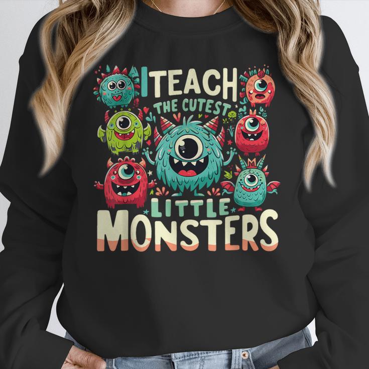 I Teach The Cutest Little Monsters Teacher Halloween Outfit Women Crewneck Sweatshirt, funny design I Teach The Cutest Little Monsters Teacher Halloween Outfit Women Crewneck Sweatshirt, funny design