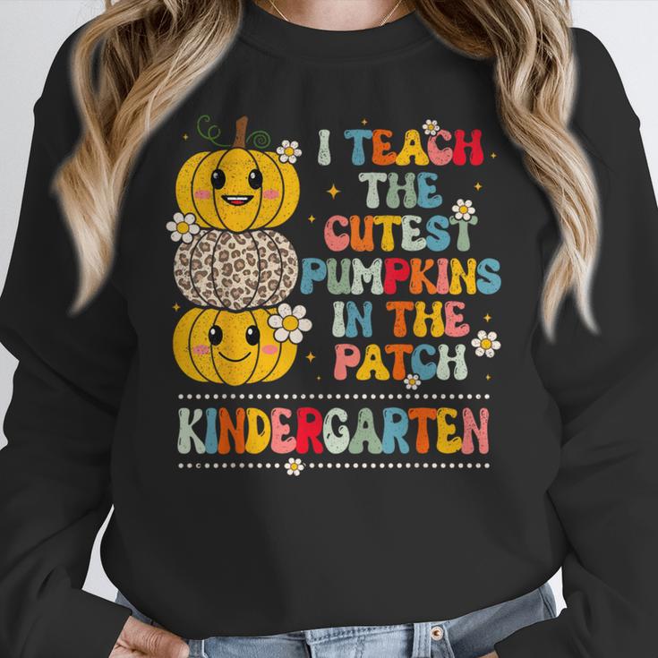 I Teach The Cutest Pumpkins Kindergarten Teacher Halloween Women Crewneck Sweatshirt, funny design