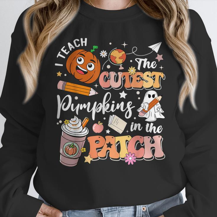 I Teach The Cutest Pumpkins In The Patch Halloween Teacher Women Crewneck Sweatshirt, funny design