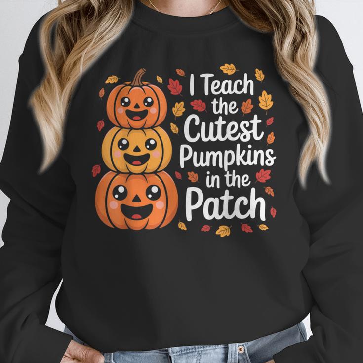 i Teach The Cutest Pumpkins In The Patch Teacher Halloween Women Crewneck Sweatshirt, funny design