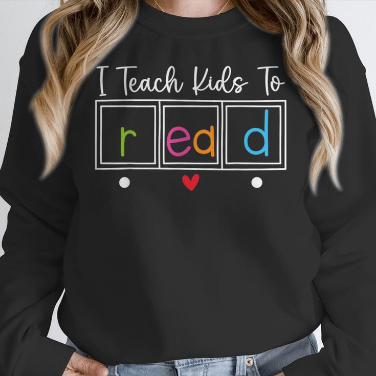 I Teach Kids To Read Reading Teacher Appreciation Women Crewneck Sweatshirt, funny design I Teach Kids To Read Reading Teacher Appreciation Women Crewneck Sweatshirt, funny design