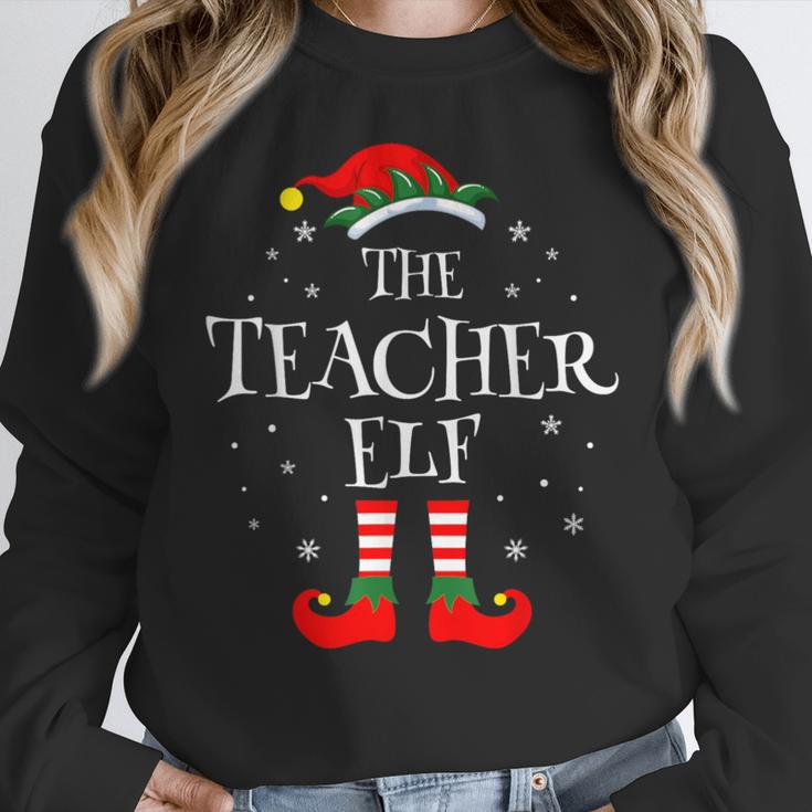 The Teacher Elf Christmas Family Matching Group Xmas Women Crewneck Sweatshirt, funny design The Teacher Elf Christmas Family Matching Group Xmas Women Crewneck Sweatshirt, funny design
