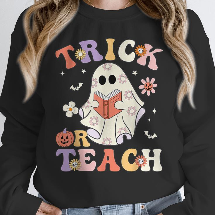 Teacher Halloween Trick Or Teach Floral Ghost Women Crewneck Sweatshirt, funny design Teacher Halloween Trick Or Teach Floral Ghost Women Crewneck Sweatshirt, funny design