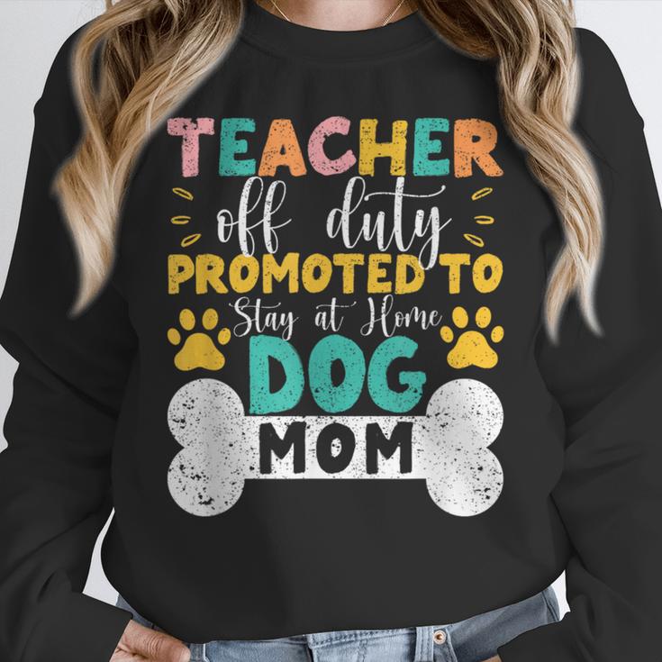 Teacher Off Duty Promoted To Stay At Home Dog Mom Teachers Women Crewneck Sweatshirt, funny design Teacher Off Duty Promoted To Stay At Home Dog Mom Teachers Women Crewneck Sweatshirt, funny design