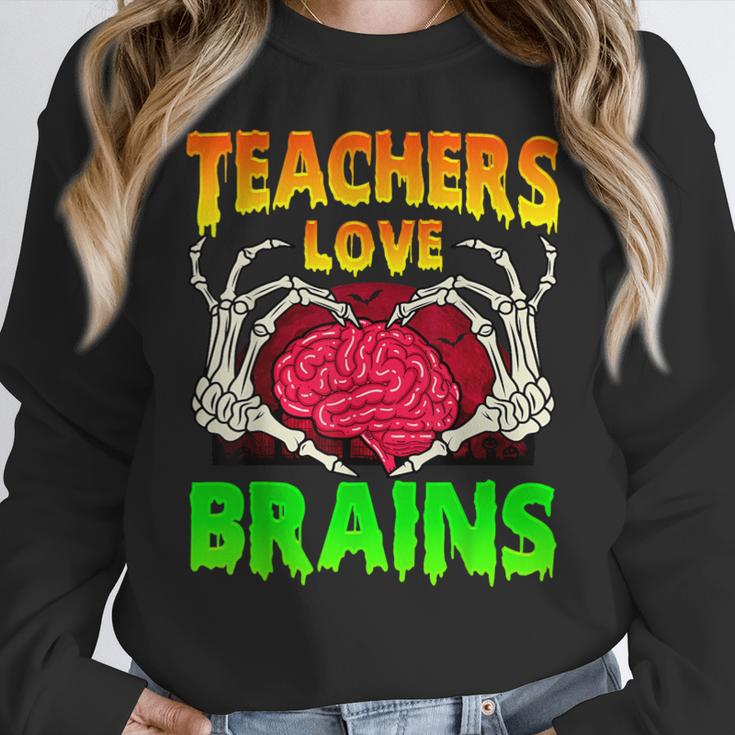 Teacher Teachers Love Brains Skeleton Hand Heart Halloween Women Crewneck Sweatshirt, funny design Teacher Teachers Love Brains Skeleton Hand Heart Halloween Women Crewneck Sweatshirt, funny design