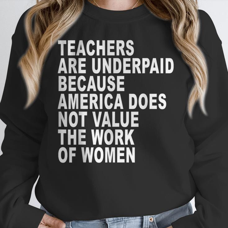 Teachers Are Underpaid Because America Does Not Value Men Women Women Crewneck Sweatshirt, funny design Teachers Are Underpaid Because America Does Not Value Men Women Women Crewneck Sweatshirt, funny design