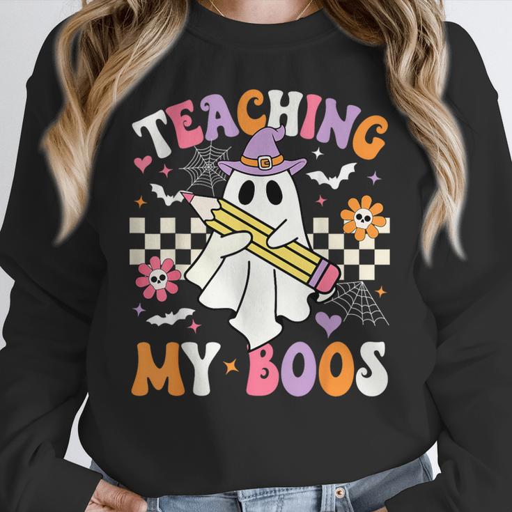 Teaching My Boos Ghost Teacher Cute Groovy Halloween Teacher Women Crewneck Sweatshirt, Groovy Teacher Gifts, funny design Teaching My Boos Ghost Teacher Cute Groovy Halloween Teacher Women Crewneck Sweatshirt, Groovy Teacher Gifts, funny design