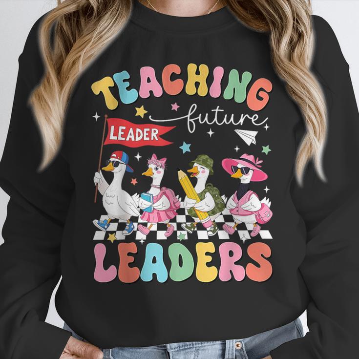 Teaching Future Leaders Groovy Teacher Back To School Women Crewneck Sweatshirt, Future Teacher Gifts, Groovy Teacher Gifts, funny design Teaching Future Leaders Groovy Teacher Back To School Women Crewneck Sweatshirt, Future Teacher Gifts, Groovy Teacher Gifts, funny design