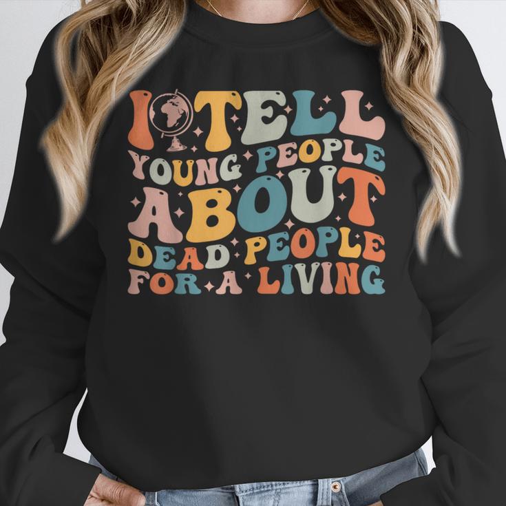 I Tell Young People About Dead People Groovy History Teacher Women Crewneck Sweatshirt, History Teacher Gifts, Groovy Teacher Gifts, funny design I Tell Young People About Dead People Groovy History Teacher Women Crewneck Sweatshirt, History Teacher Gifts, Groovy Teacher Gifts, funny design