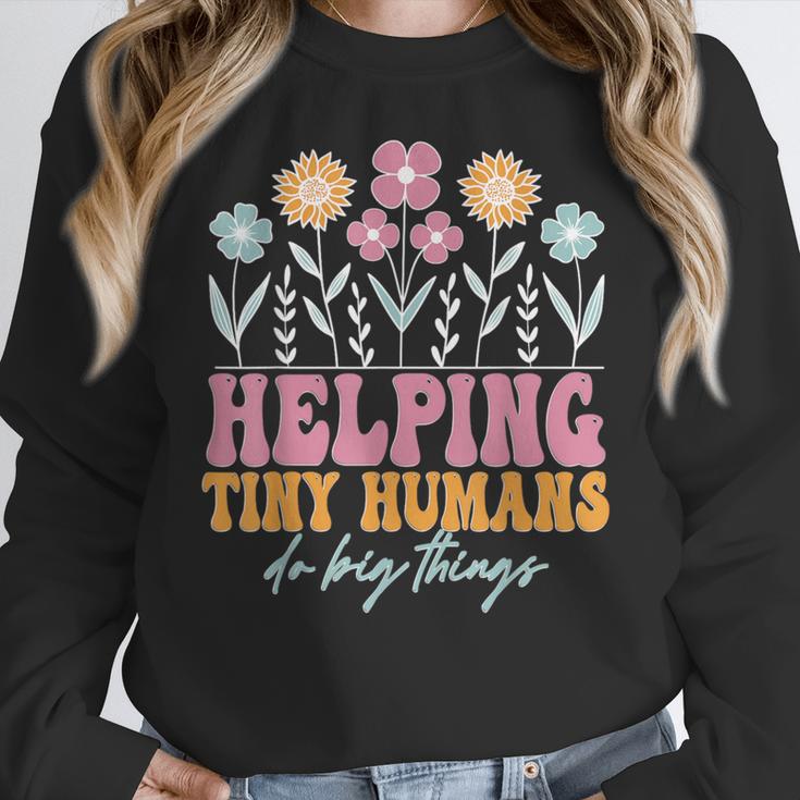 Tiny People Help Do Big Things Nursery Teacher Women Crewneck Sweatshirt, funny design Tiny People Help Do Big Things Nursery Teacher Women Crewneck Sweatshirt, funny design