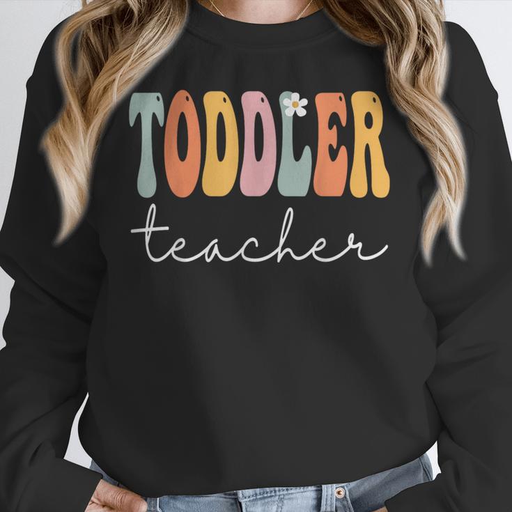 Toddler Teacher Retro Groovy Women Happy First Day Of School Women Crewneck Sweatshirt, Groovy Teacher Gifts, funny design Toddler Teacher Retro Groovy Women Happy First Day Of School Women Crewneck Sweatshirt, Groovy Teacher Gifts, funny design