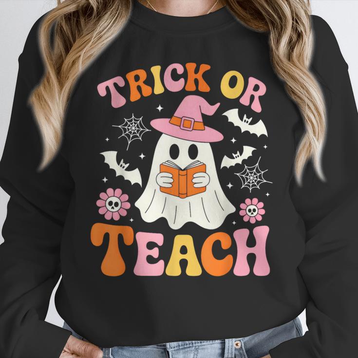 Trick Or Teach Cute Floral Ghost Teacher Halloween Costume Women Crewneck Sweatshirt, funny design