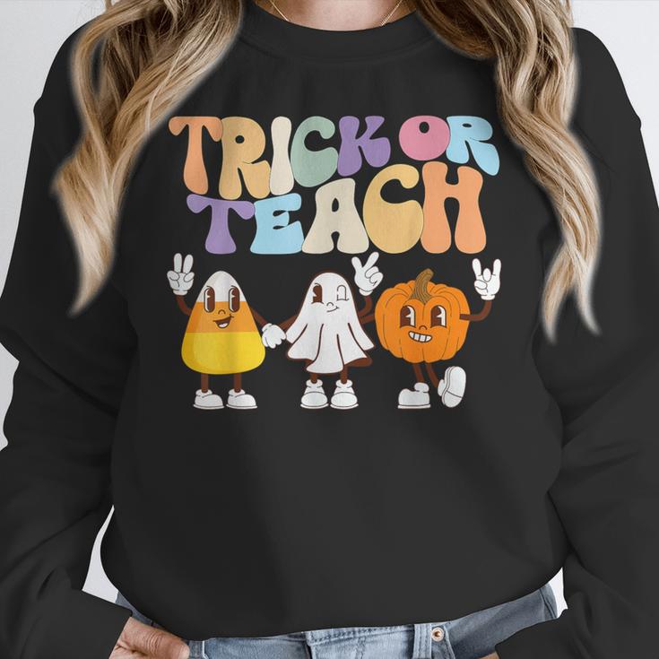 Trick Or Teach Cute Halloween Teacher Women Crewneck Sweatshirt, funny design Trick Or Teach Cute Halloween Teacher Women Crewneck Sweatshirt, funny design