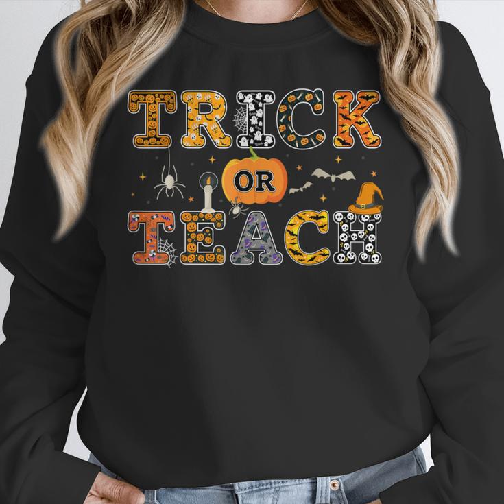Trick Or Teach Funny School Teacher Halloween Costume Women Crewneck Sweatshirt, funny design Trick Or Teach Funny School Teacher Halloween Costume Women Crewneck Sweatshirt, funny design
