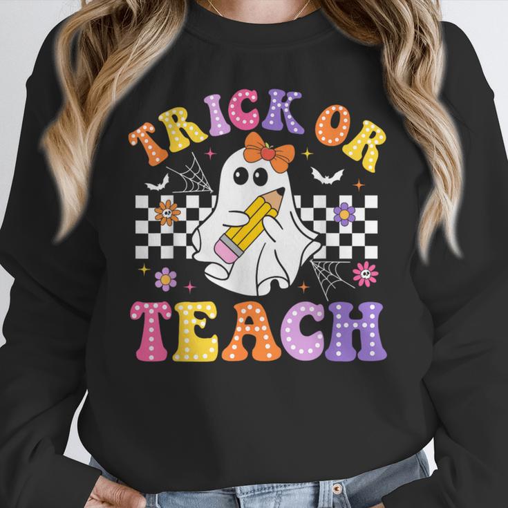 Trick Or Teach Groovy Halloween Teachers Women Crewneck Sweatshirt, funny design