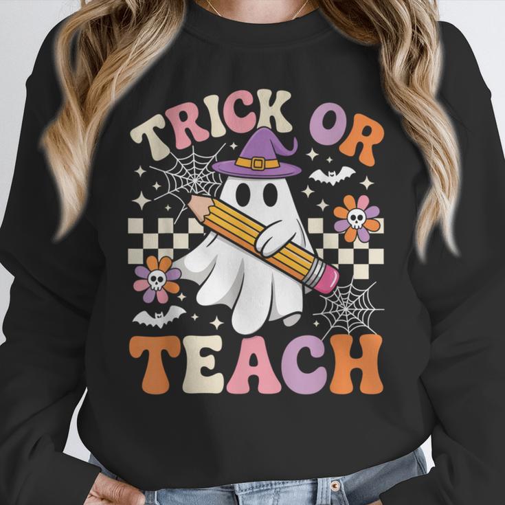 Trick Or Teach Groovy Teacher Halloween Retro Ghost Women Crewneck Sweatshirt, Groovy Teacher Gifts, funny design