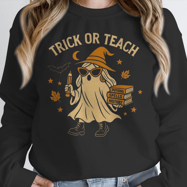 Trick Or Teach Halloween Teacher Women Crewneck Sweatshirt, funny design Trick Or Teach Halloween Teacher Women Crewneck Sweatshirt, funny design